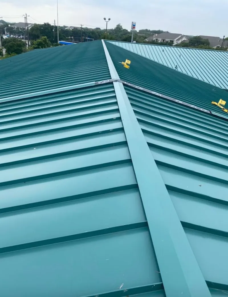 Green commercial metal roof ridge and valley for Metal Roof Repair in Raytown