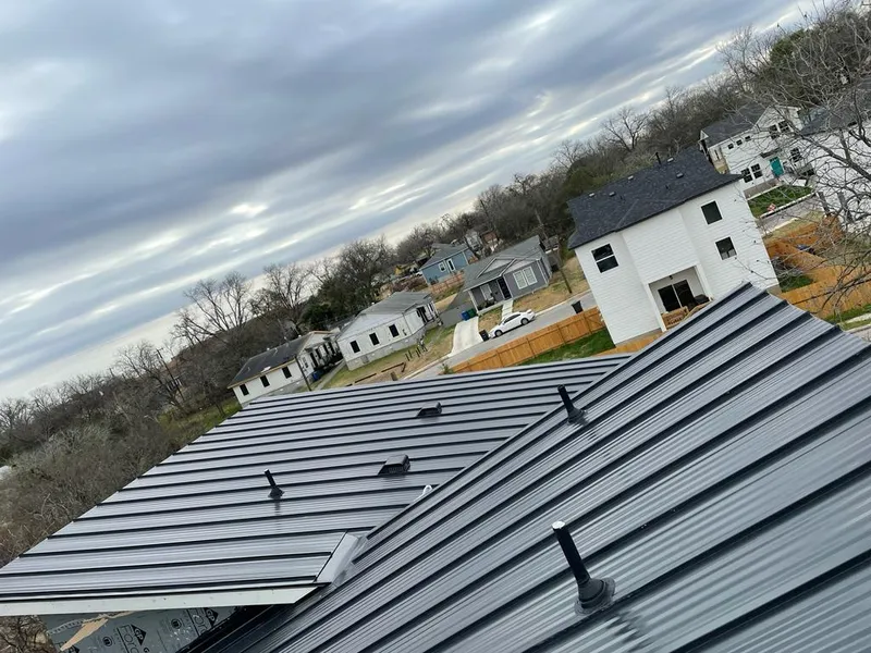 Standing seam metal roof panels with vents for Skylight Repair in Raytown